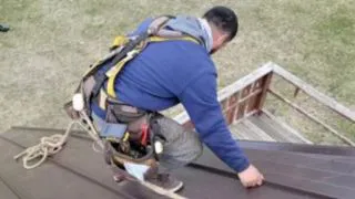 Construction Jobs in Idaho Falls CCX Construction Worker working on roof in Idaho Falls