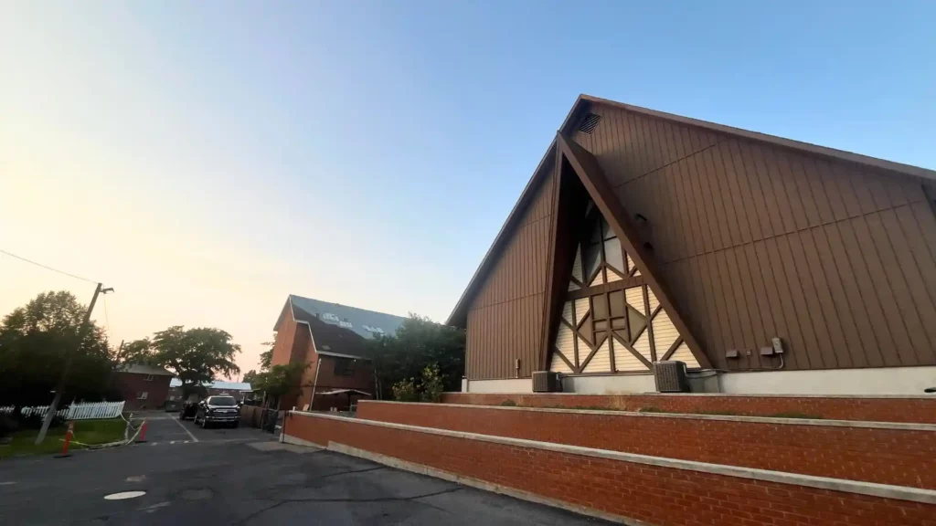 A church with a new roof and siding installed by CCX Roofing